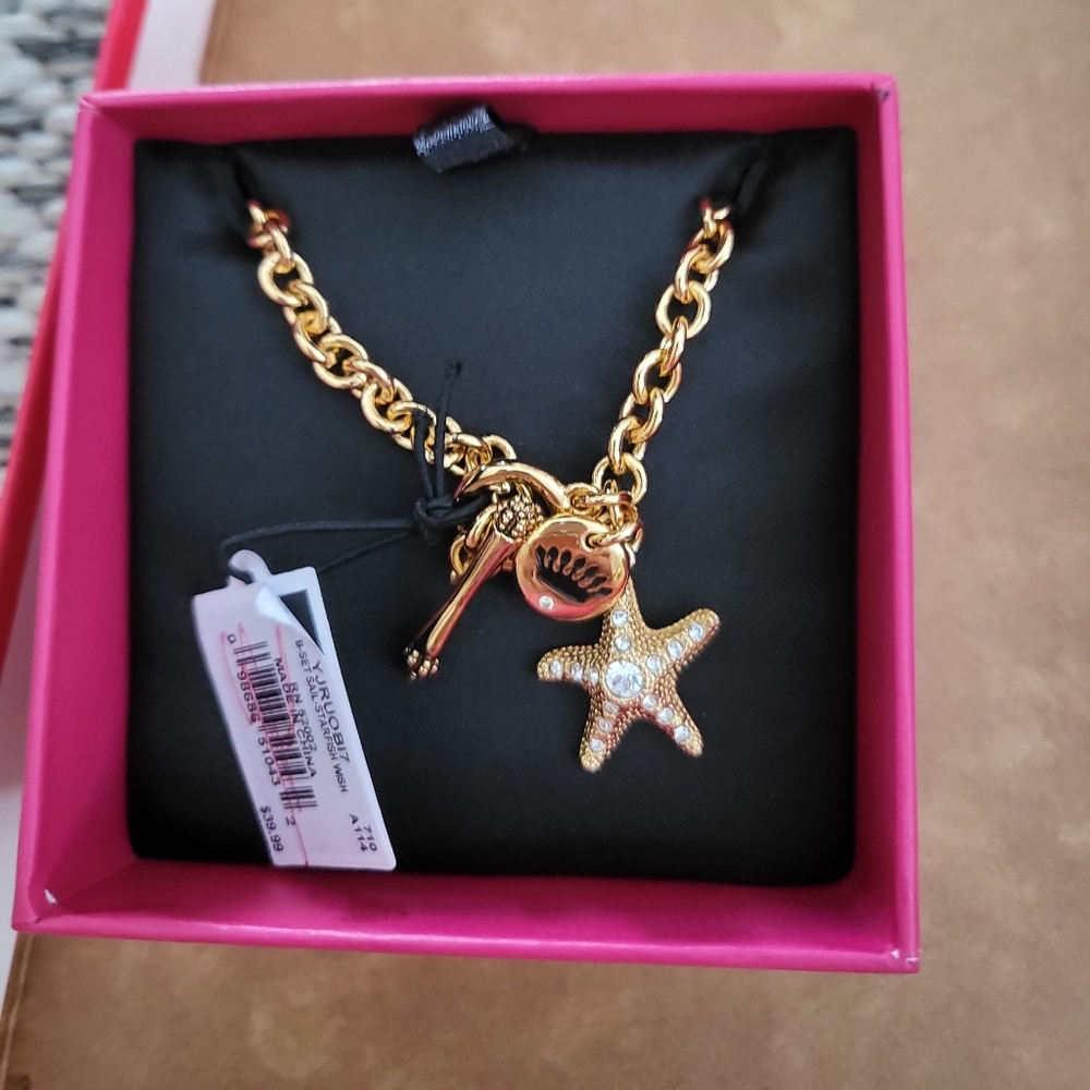 Gold tone bracelet juicy couture